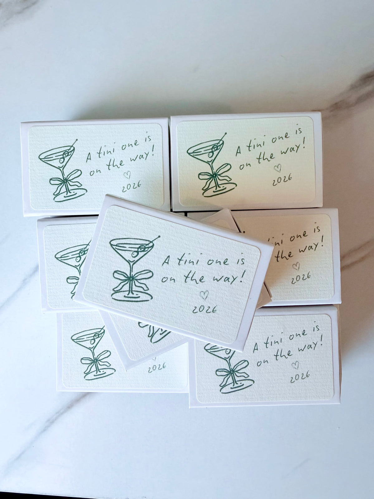 Personalized martini baby shower matchboxes styled lifestyle photo