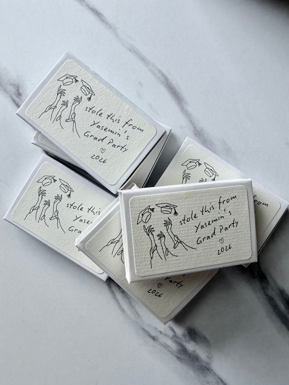 Personalized graduation matchboxes styled lifestyle photo