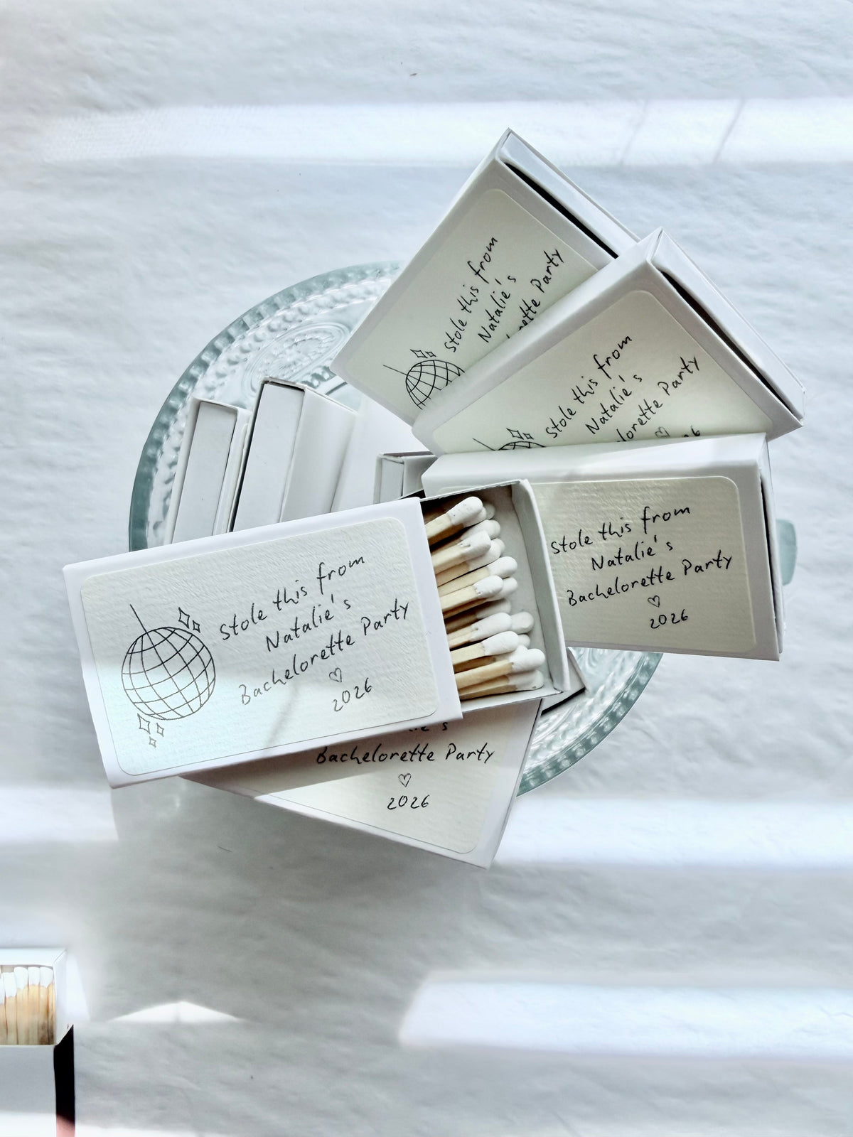 Personalized bachelorette disco ball matchboxes styled lifestyle photo