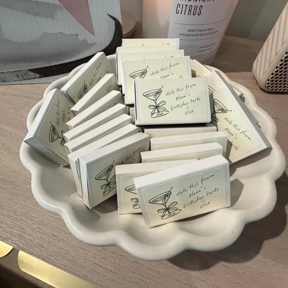 Personalized martini birthday matches displayed as custom birthday party favors